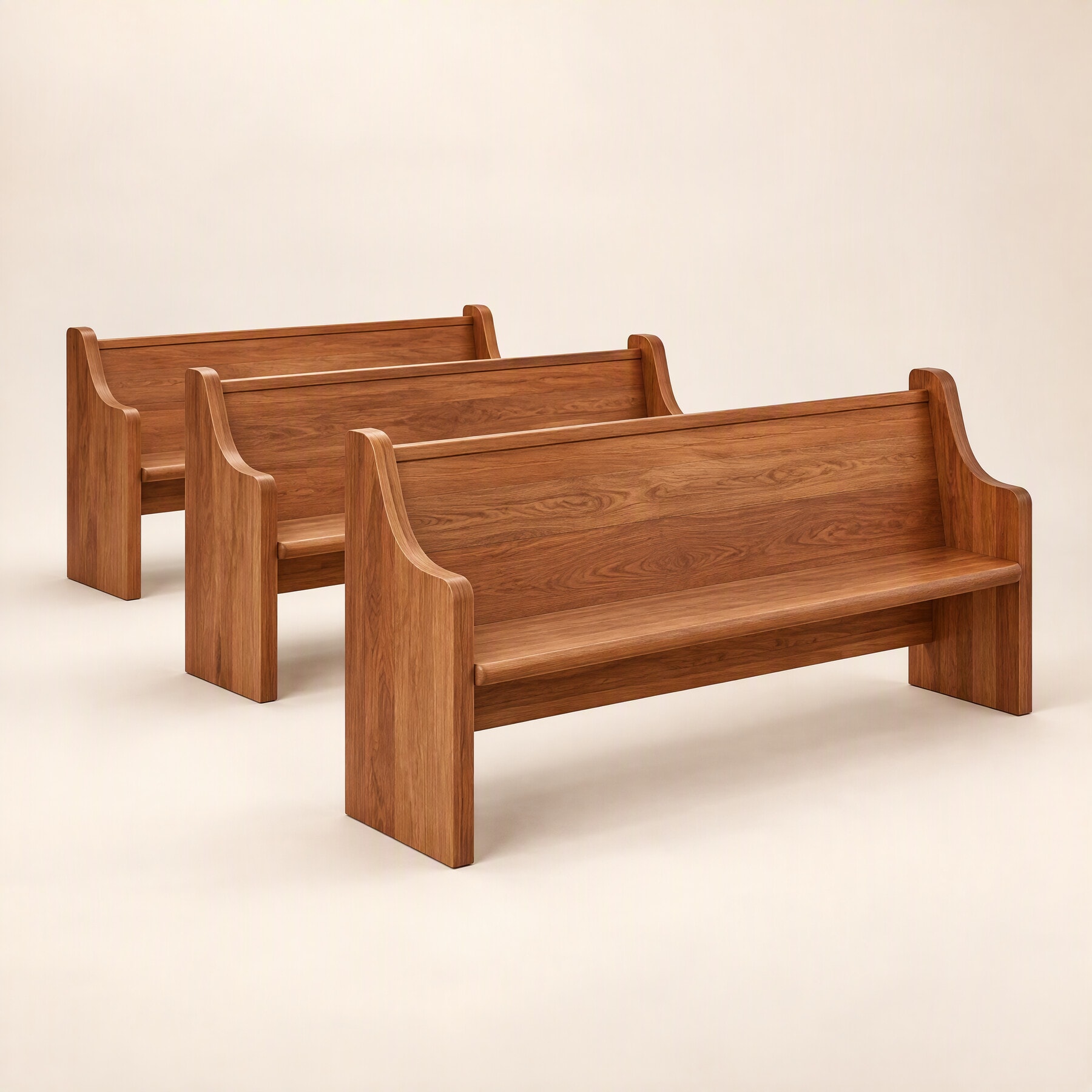 Three solid-timber church pews with curved ends, one behind the other, on a cream studio background