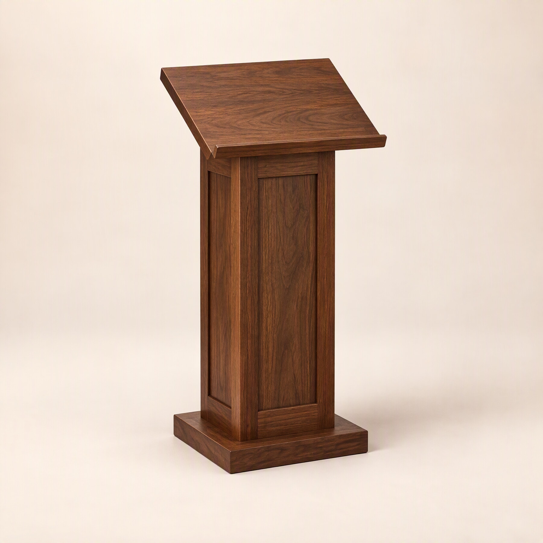 A dark brown lectern with a sloped top on a panelled stand