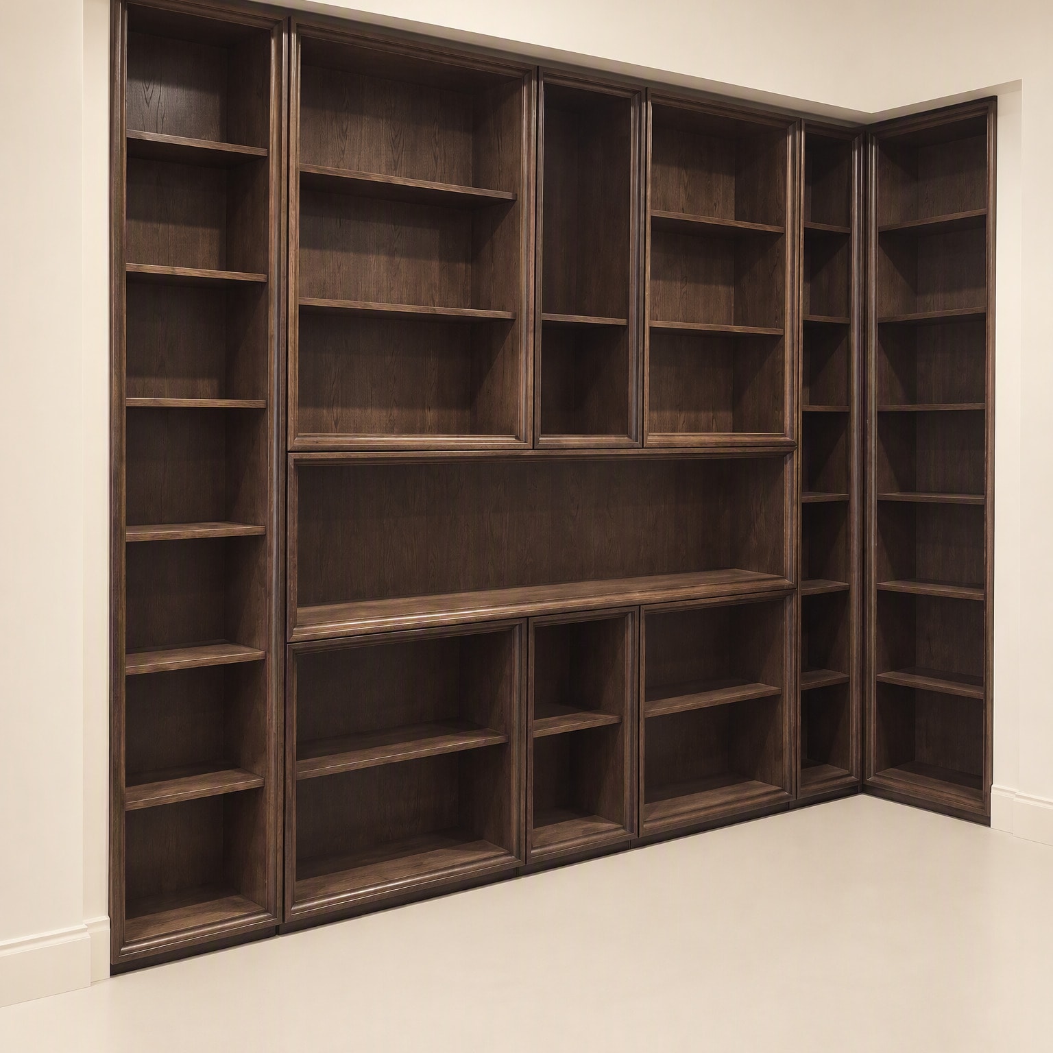 Dark timber bookshelves built floor to ceiling around a room corner