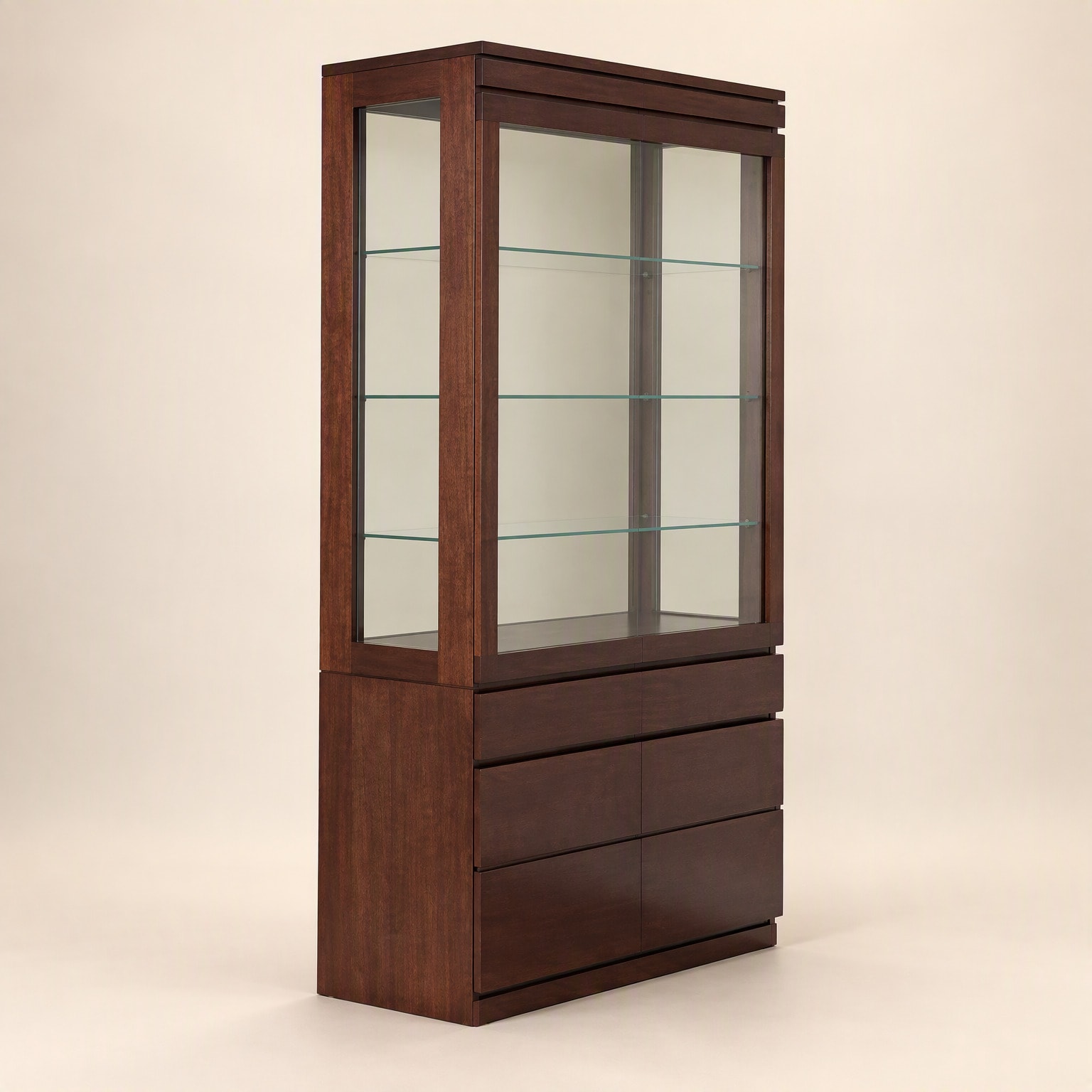 A tall dark-timber display cabinet with a glazed top over drawers
